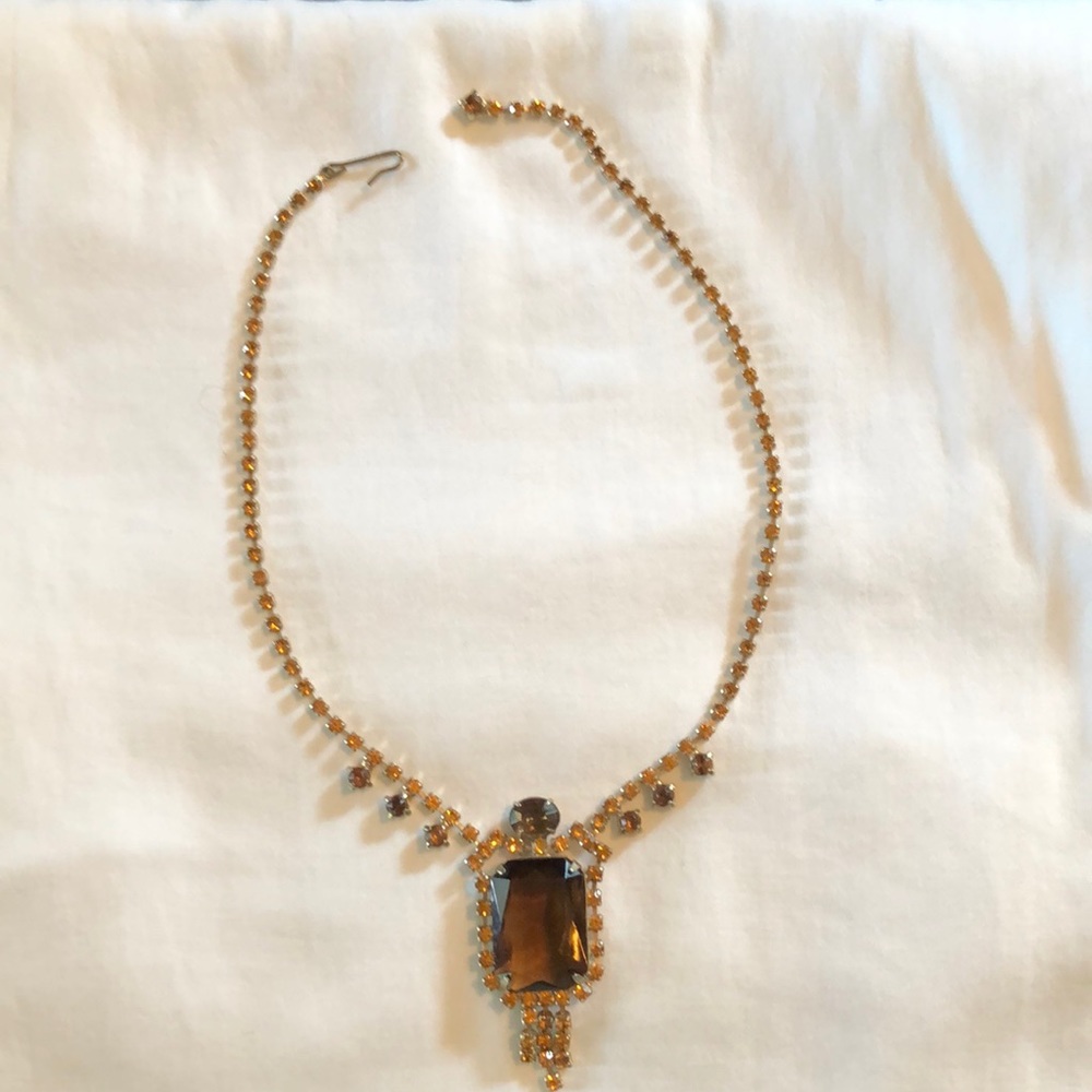 Vintage necklace with topaz-colored stones